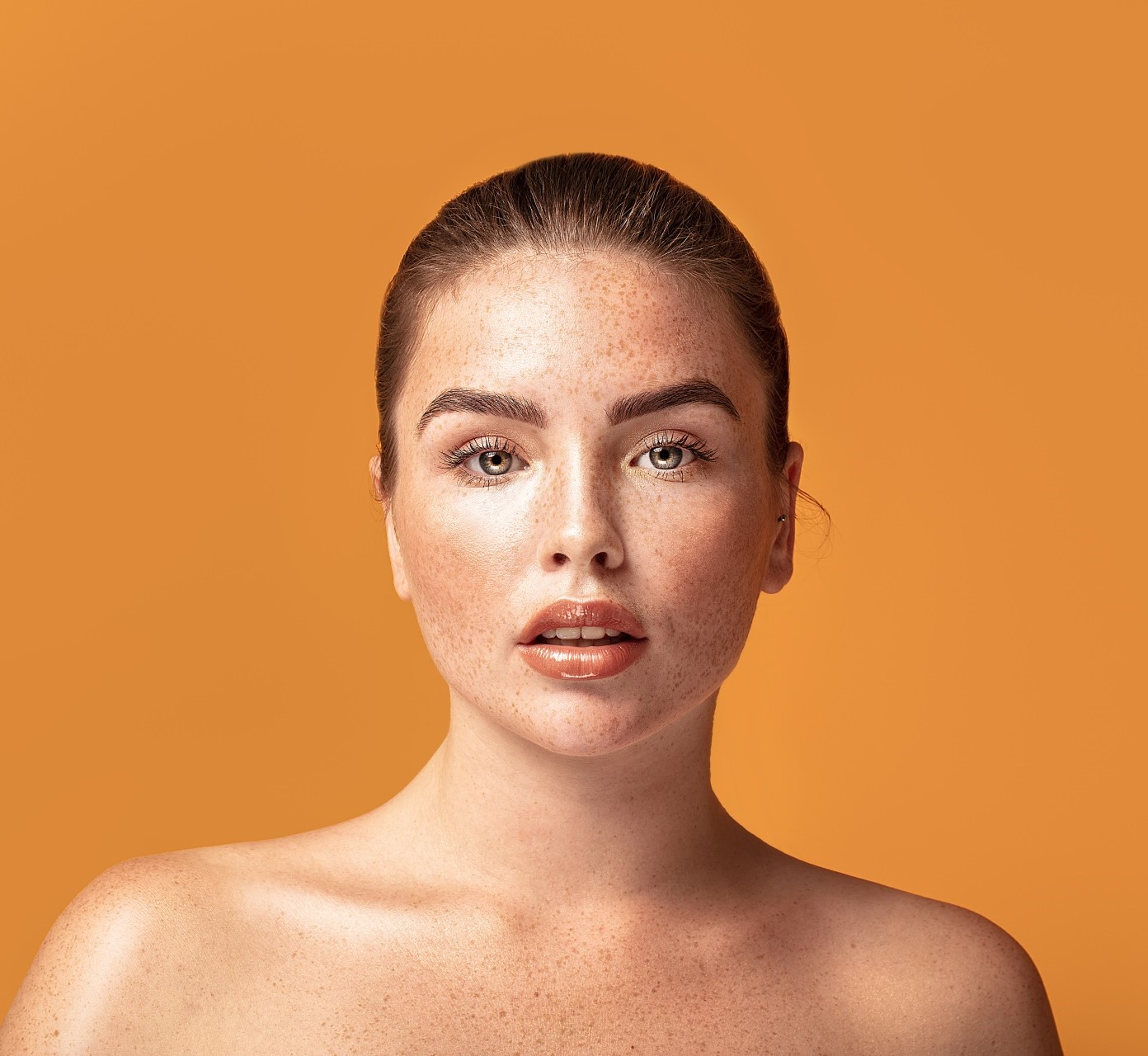 Beauty portrait of woman with freckles